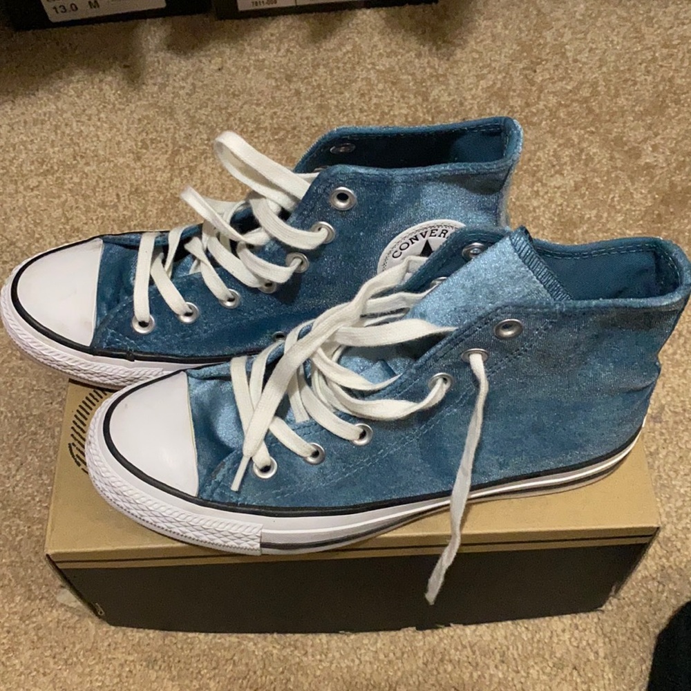 Teal and white women’s Converse